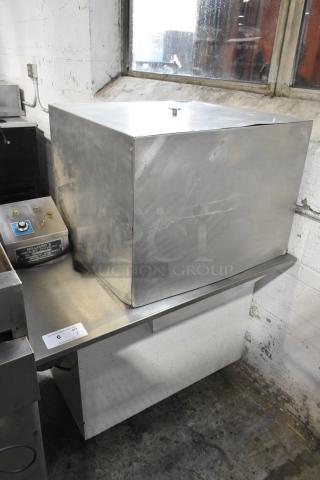Hilliard's Stainless Steel Commercial Floor Style Chocolate Tempering Kettle on Commercial Casters.