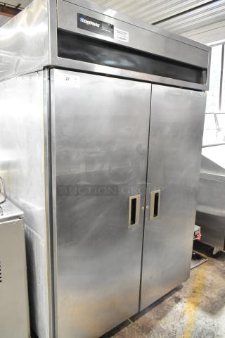 Delfield Stainless Steel Commercial 2 Door Reach In Cooler w/ Poly Coated Racks on Commercial Casters. 115 Volts, 1 Phase.