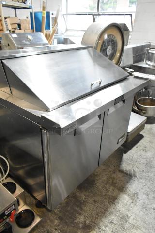 2018 Migali C-SP48-18BT-HC Stainless Steel Commercial Sandwich Salad Prep Table on Commercial Casters. 115 Volts, 1 Phase.