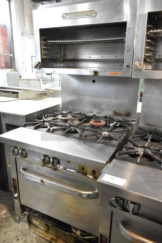 Southbend P32D-BBB Stainless Steel Commercial Natural Gas Powered 6 Burner Range w/ Oven, Salamander Cheese Melter and Back Splash.