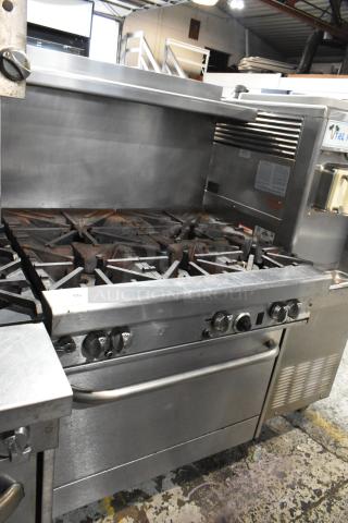 Southbend 4365D Stainless Steel Commercial Natural Gas Powered 6 Burner Range w/ Oven, Over Shelf and Back Splash.