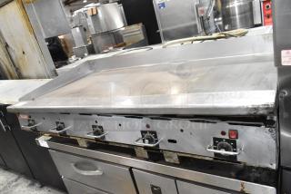 Vulcan Stainless Steel Commercial Countertop Gas Powered Flat Top Griddle w/ Thermostatic Controls.