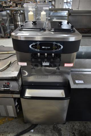 Taylor C713-33 Stainless Steel Commercial Floor Style Air Cooled 2 Flavor w/ Twist Soft Serve Ice Cream Machine on Commercial Casters. 208-230 Volts, 3 Phase. - Item #1191212
