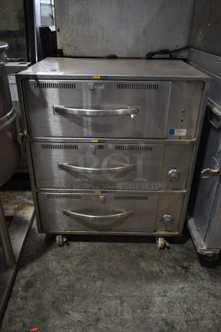 Wells RW-3 Stainless Steel Commercial 3 Drawer Warming Drawer on Commercial Casters. 120 Volts, 1 Phase. Tested and Working!