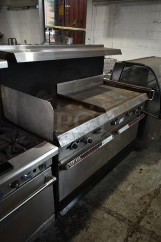Vulcan Stainless Steel Commercial Natural Gas Powered Flat Top Griddle w/ Right Side Flat Top Range, 2 Standard Oven, Over Shelf and Back Splash.