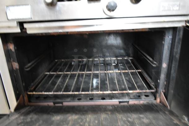 Vulcan Stainless Steel Commercial Gas Powered Flat Top Griddle w/ Right Side Flat Top Range, 2 Standard Oven, Over Shelf and Back Splash. - Image 9 of 11
