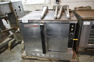 Blodgett Stainless Steel Commercial Natural Gas Powered Full Size Convection Oven w/ Solid Doors, Metal Oven Racks, Thermostatic Controls and Metal Legs. - Item #1191456