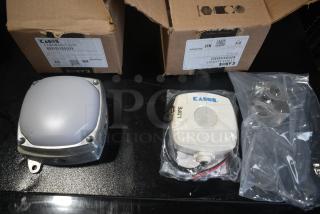 2 BRAND NEW SCRATCH AND DENT! Items Including Kason® 1808 5 1/8" x 5 1/8" Surface Mount LED Light Fixture, 120V, 13W and Kason® 1901A Low Bay Walk-In Motion Sensor with Mounting Kit, 120V-277V. 2 Times Your Bid!