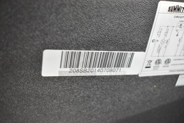 Barcode on textured surface with serial number 208SB20140708071 and electrical schematic label for Summit appliance.