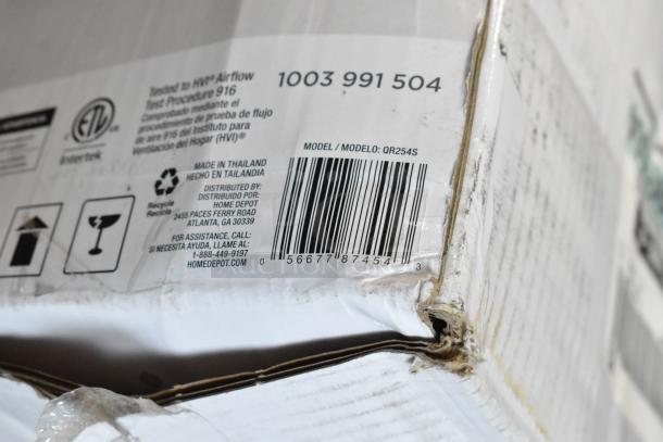 Damaged cardboard box showing model QR254S barcode, made in Thailand, distributed by Home Depot. Some wear visible.