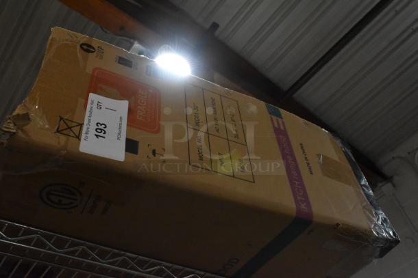 Box containing a range hood, model KCO1-30", input AC 110V, dimensions 32.9"x19.8"x22.7", labeled as fragile.