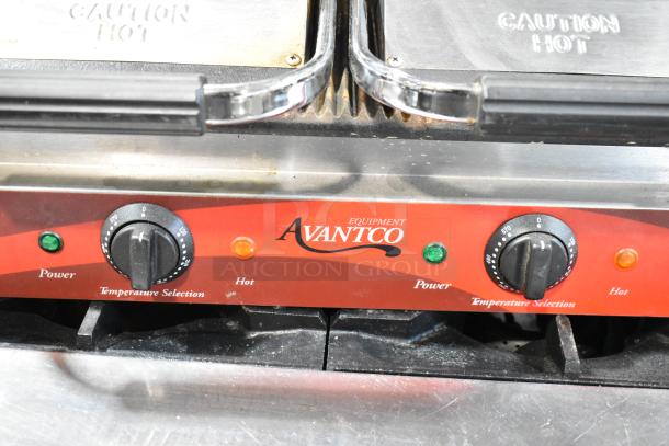 Avantco dual panini grill with temperature controls, labeled “Caution Hot.” In good condition, featuring power and heat indicators.