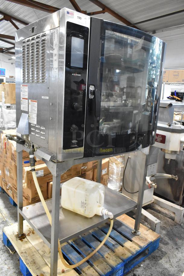 Alto-Shaam commercial oven with digital controls, stainless steel exterior, on metal stand, used condition with visible wear.