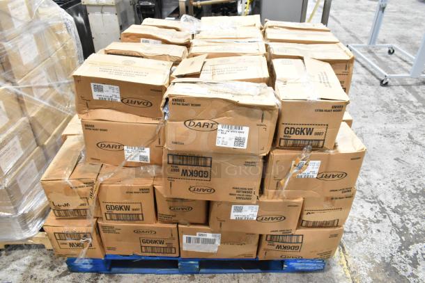 Pallet of cardboard boxes labeled "Dart Extra Heavy Weight Knives," each containing 1000 pieces, showing some wear.