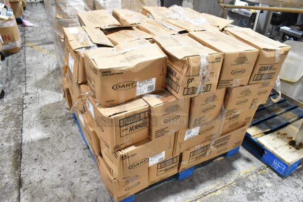 Pallet of cardboard boxes labeled "Dart Knives Extra Heavy Weight," 1000 per case, some boxes damaged, stacked on a blue pallet.