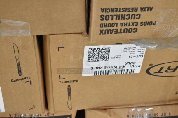 Box of Guildware Xtra-Heavy White Plastic Knives labeled "CUT-01" for bulk distribution. Packaging intact.