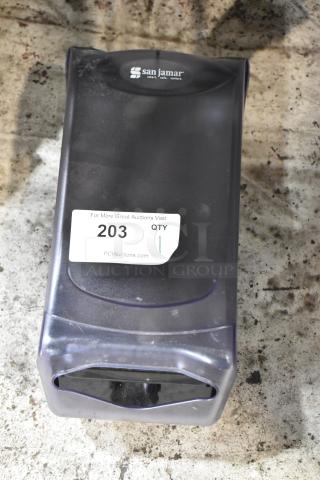 San Jamar towel dispenser, black, with model label and auction tag 203. Used condition.