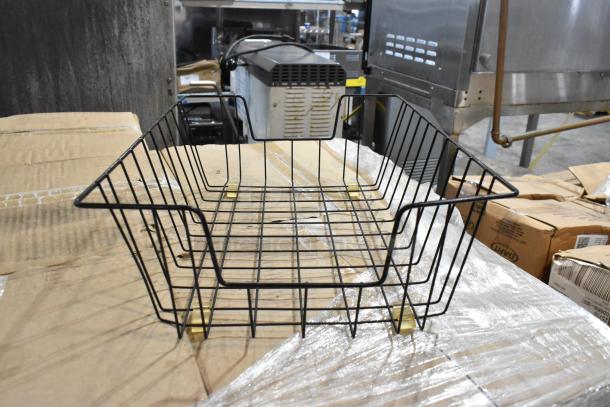 Black wire storage basket with gold accents, in excellent condition. Ideal for organizing or decorative purposes.