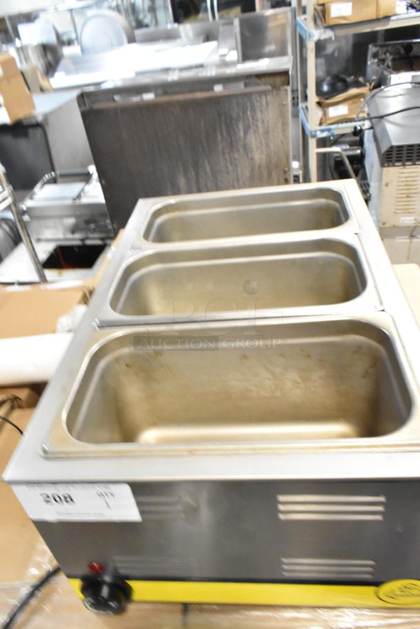 Commercial stainless steel three-compartment food warmer in used condition with visible control knob and auction tag marked "208".