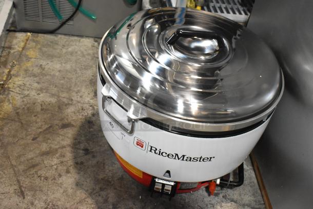 RiceMaster commercial rice cooker, model 40, stainless steel lid, durable condition, ideal for large-scale cooking.