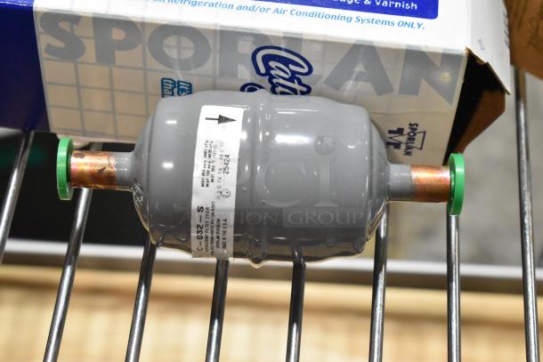 Sporlan Catch-All Filter-Drier model C-032-S in excellent condition, with visible label indicating part number and specifications.