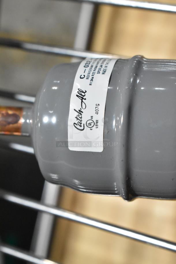 Catch-All C-032 filter drier, gray, UL listed, refrigeration use, R134A compatibility, made in Mexico, 407g capacity.