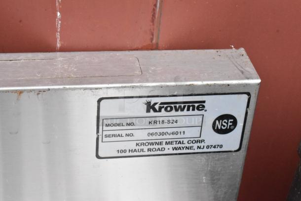 Krowne KR18-S24 metal piece with NSF label, Model No. KR18-S24, Serial No. 06030006011, showing some wear.
