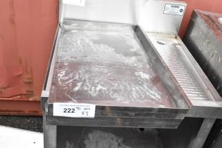 Krowne stainless steel commercial griddle with side drip tray. Visible wear and rust. Tag indicates auction lot number 222.