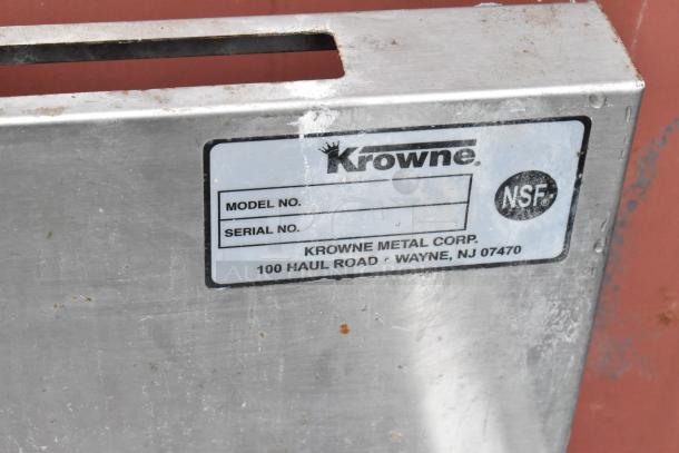 Krowne stainless steel equipment with NSF label; visible wear. Model and serial number section blank.