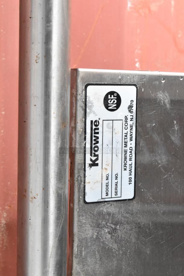 Krowne stainless steel equipment with NSF label, model number space unfilled, some wear visible.