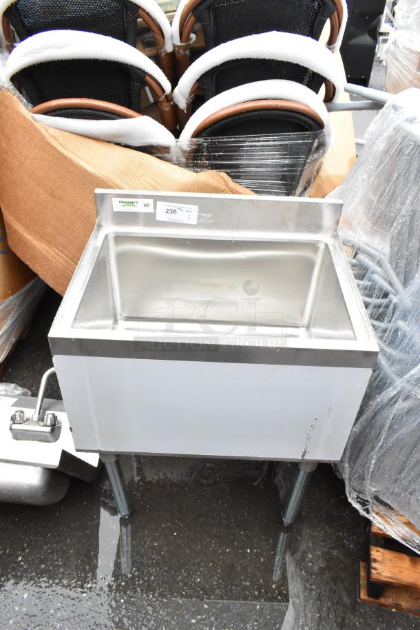 Stainless steel hand sink with backsplash, NSF certified, Regency brand, slight wear, with labeled tag "236."