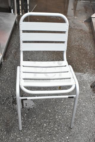 16 BRAND NEW SCRATCH AND DENT! Lancaster Table & Seating 427CTSSDCHM Silver Outdoor Side Chair. 16 Times Your Bid! - Item #1191602