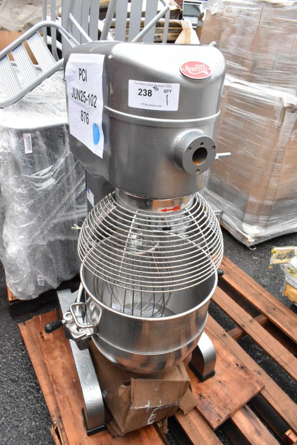 Industrial stand mixer with metal bowl and wire guard, labeled Avancini. Tags show auction info: "238", "Jun25-102".