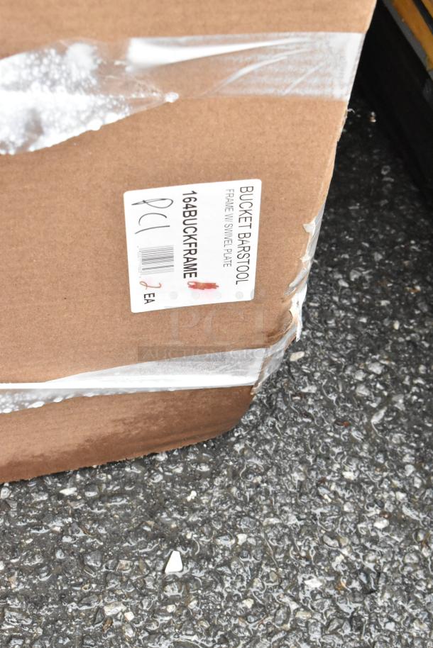 Box labeled "Bucket Barstool Frame with Swivel Plate," showing slight wear. Contains 2 units, marked "164BUCKFRAME."
