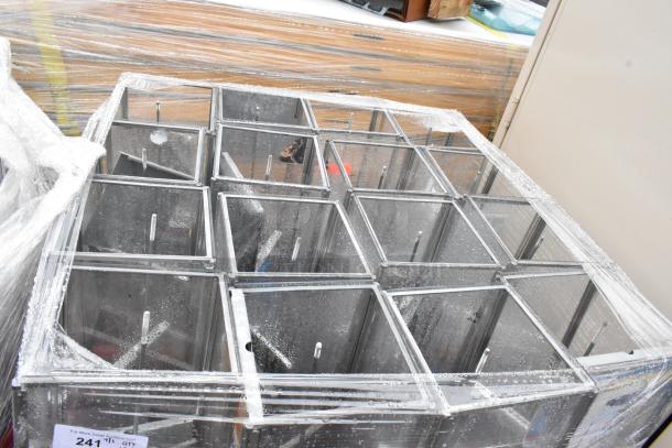 Glass display cases wrapped for shipping, grid pattern, excellent condition, ideal for retail use. Item tag reads "Lot 2411."