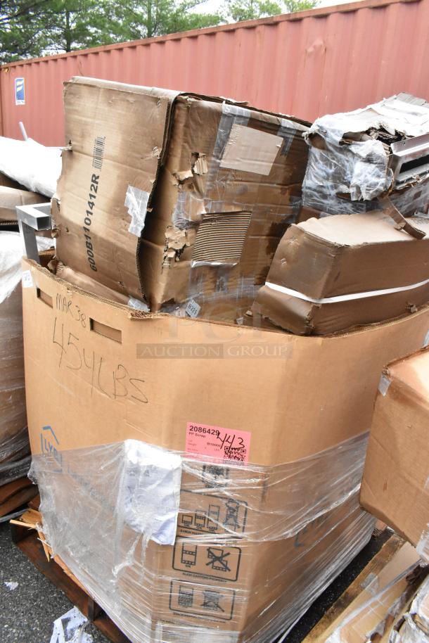 Damaged cardboard box on pallet labeled "454 LBS" and "PP Scrap." Visible stickers and markings, showing signs of wear.