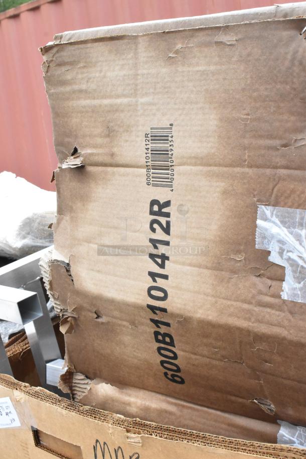Damaged cardboard box with barcode and code 600B1101412R, showing signs of wear and tear. No other details visible.