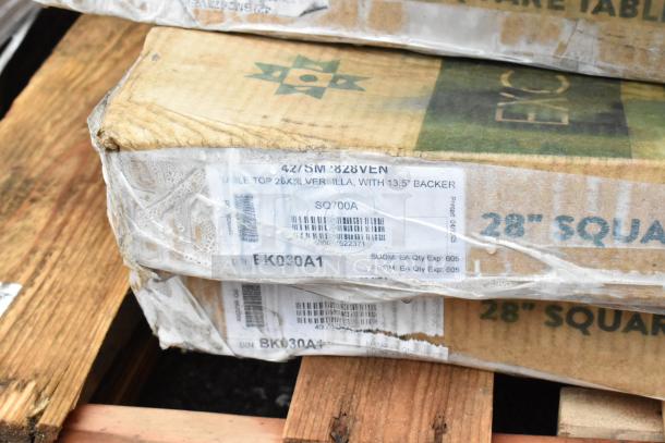 Packaged table top in wrapping showing details: 26x28 size, label reads "Versilla, with 13.5" backer." Appears new.