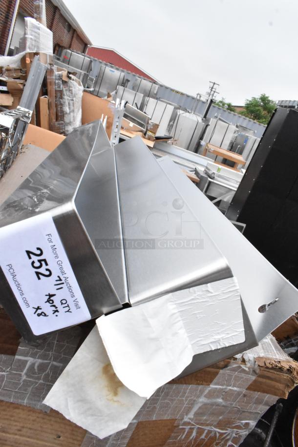 Stainless steel corner guard, new condition, item label "252" with quantity "11 qty" noted on visible tag.