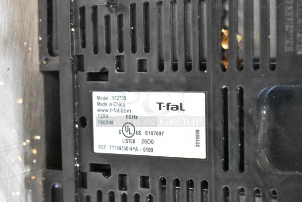 T-fal appliance back panel with label showing Model 572705, 120V, 1800W, UL listed, made in China.