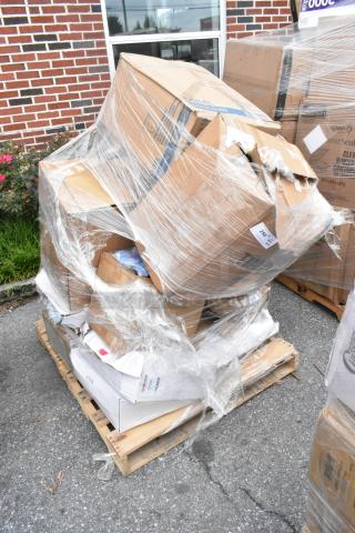 Pallet of assorted damaged boxes wrapped in plastic, labels partially visible, indicating mixed contents.