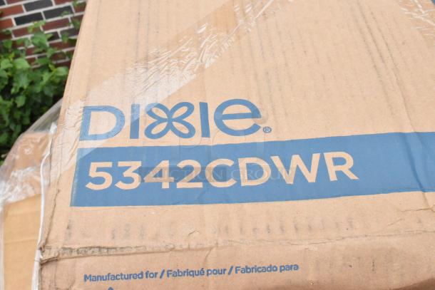 Cardboard box with "Dixie 5342CDWR" printed in blue, wrapped in plastic. Box shows some wear, possibly outdoor storage.