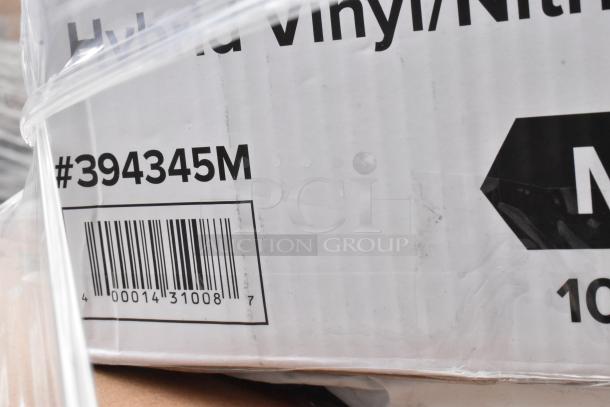 Box of hybrid vinyl/nitrile gloves, size M, model #394345M, barcode 400014310087.