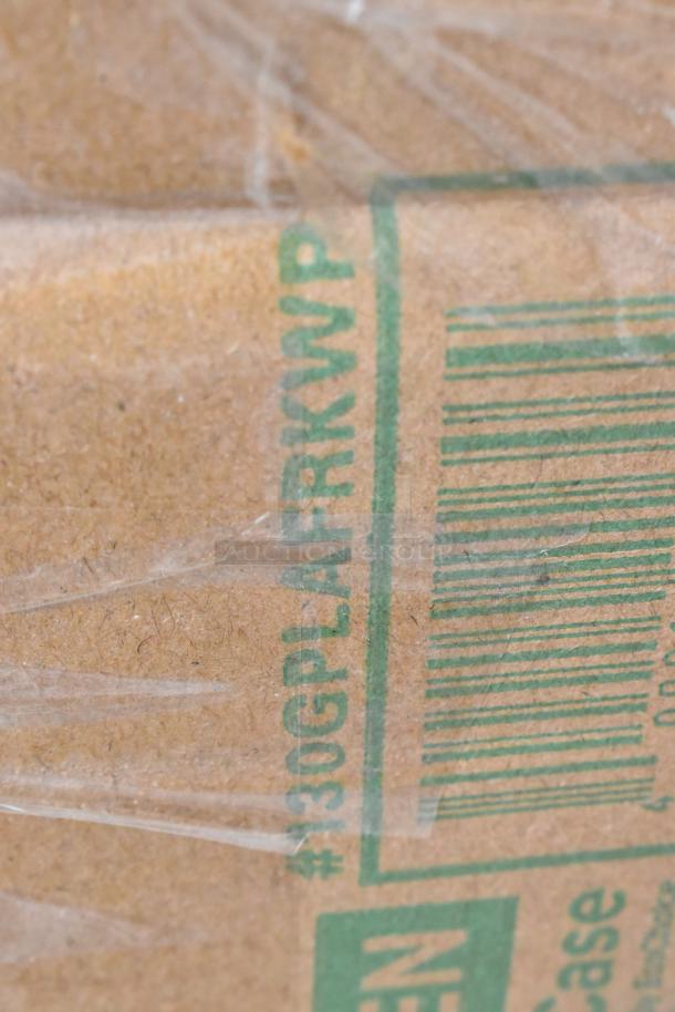 Cardboard box with plastic wrap, displaying green text "#130GPLAFRKW" and a barcode. Edges slightly worn.