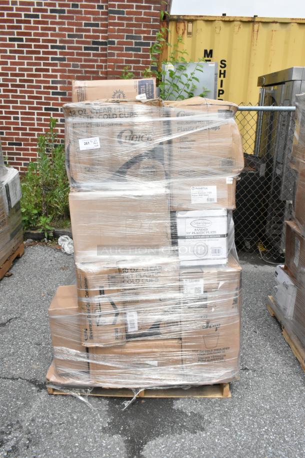 Pallet of various packaged disposable cups and plates wrapped in plastic. Visible labels include brand and product details.