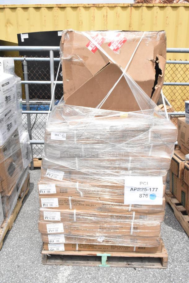 Pallet of boxed items wrapped in plastic, visible damage on a top box. Labels show SKU numbers and "Made in China."