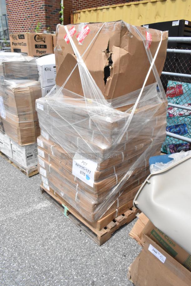 Pallet of boxed items with damaged top box, wrapped in plastic. Labels with "PCJ APR254177 876" visible.