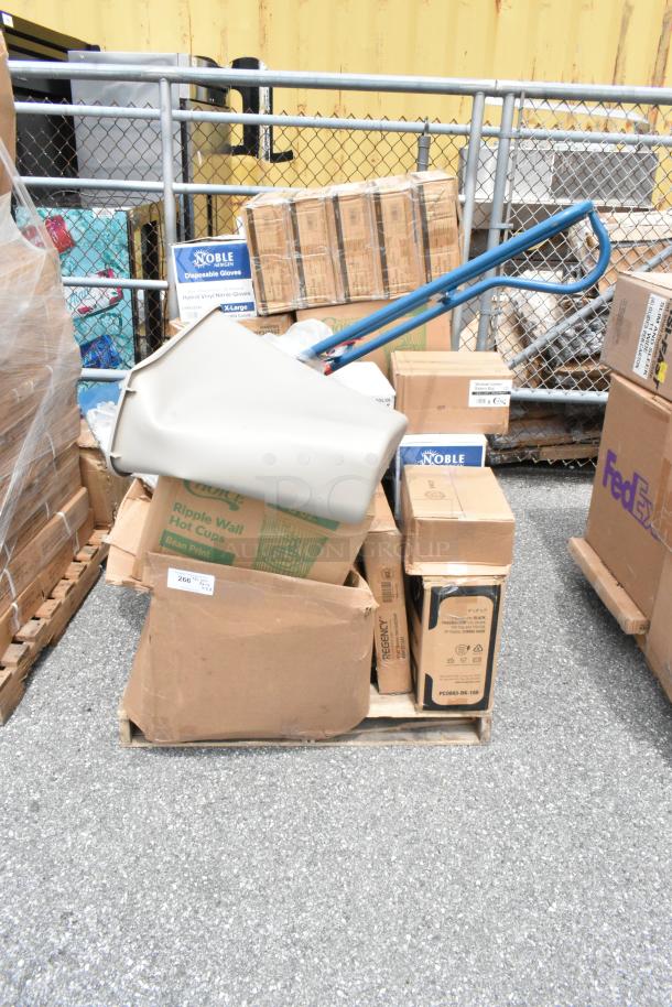 Pallet with assorted boxes including Noble disposable gloves, Regency bags, and ripple wall hot cups. Mixed condition.