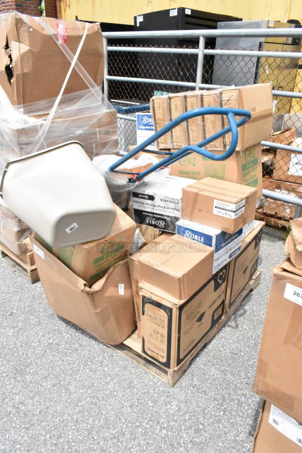Pallet of assorted boxed goods, including Choice Ripple Wall Cups and Noble disposable gloves, stacked outdoors. Signs of wear.