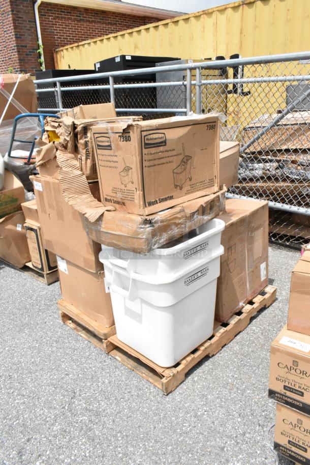 Pallet with various packed boxes including Rubbermaid mop buckets and Baker's Mark containers, some boxes are damaged.